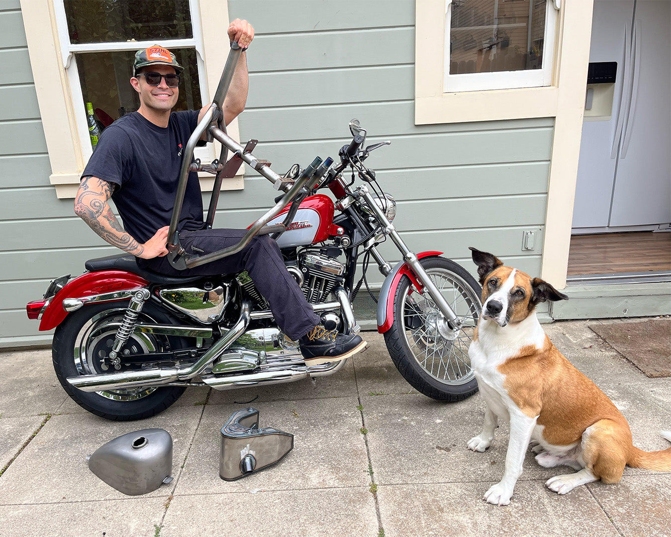 Sebastian the winner of TA5 giveaway with motorcycle and dog