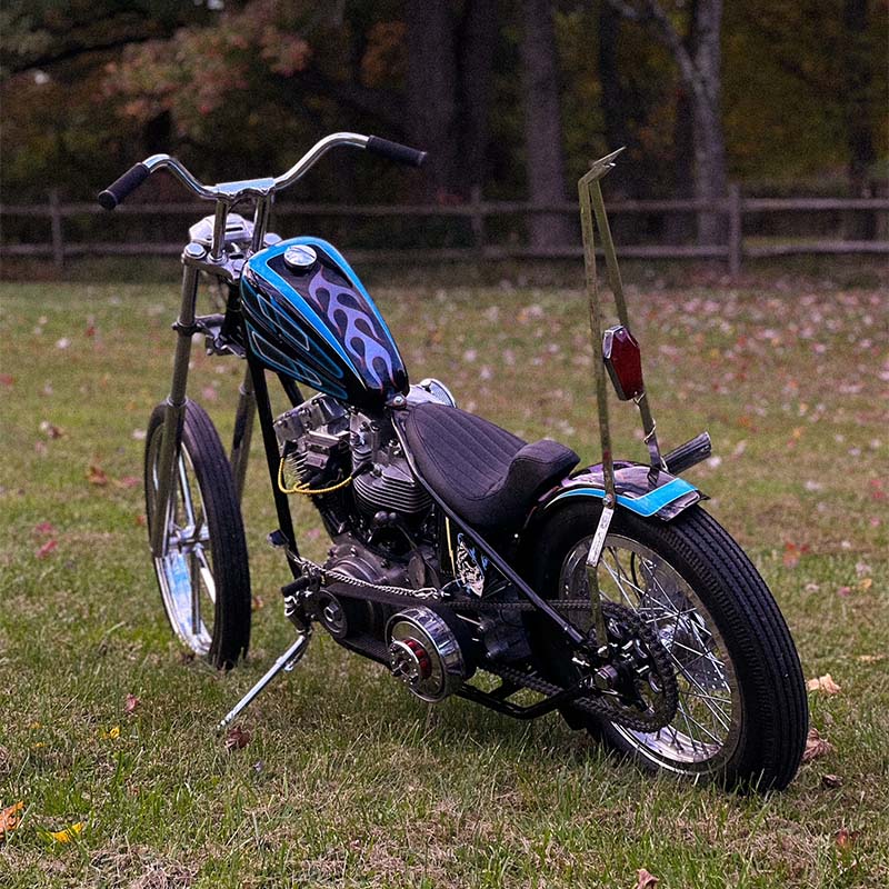 shovelhead chopper with purple flames