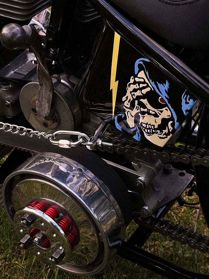 detail of chopper oil tank with skull with yellow lightning bolt